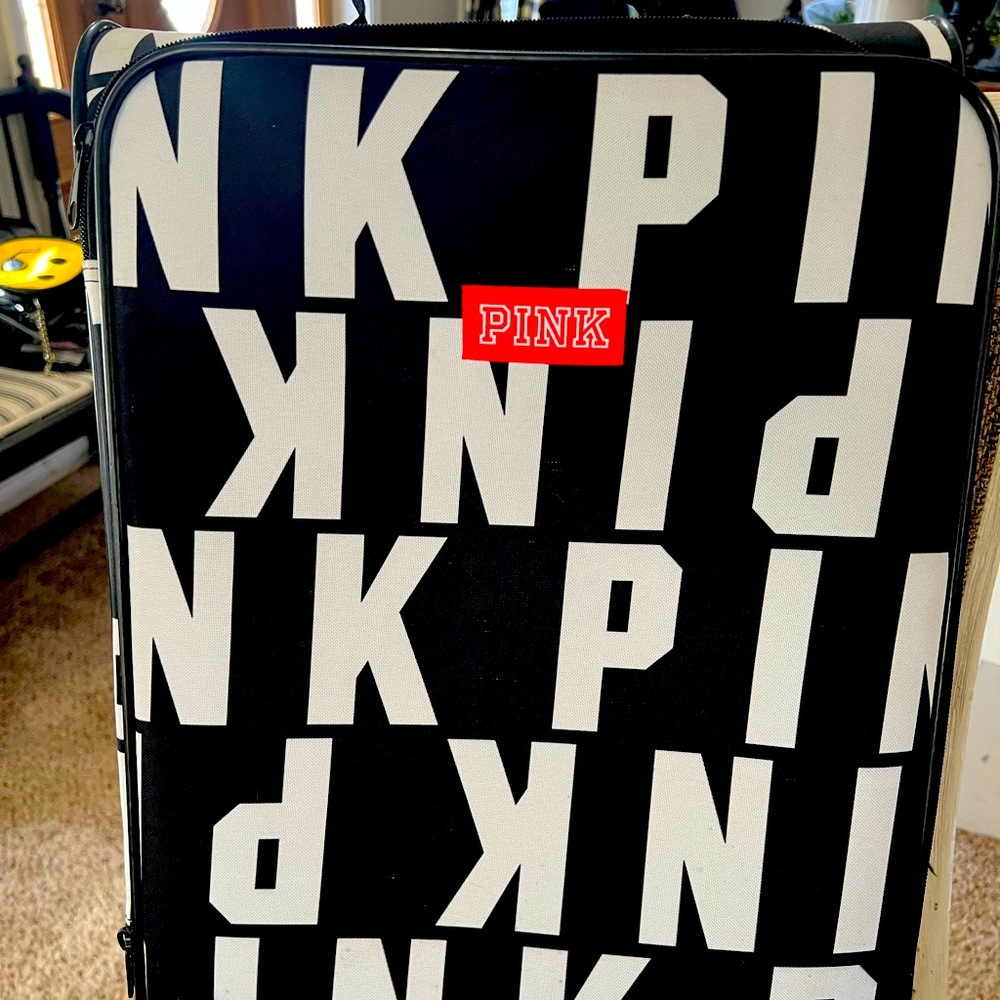 Pink VS logo luggage used 1X